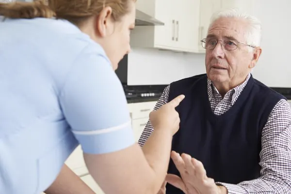 Caregiver with elderly patient